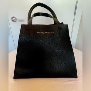 Donna Karan Black Leather unlined tote. Gently used. 15.5x5x13